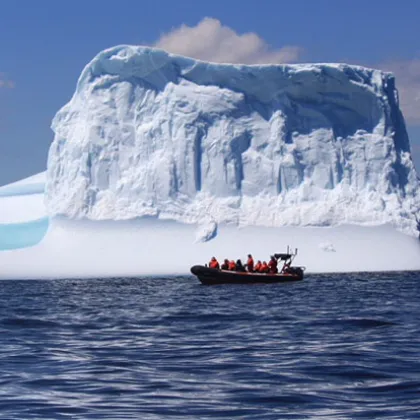 a small boat in a large body of water